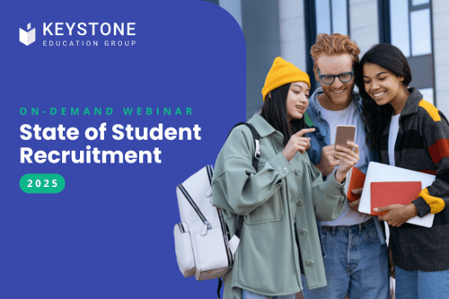 group of female and male students looking at a mobile phone