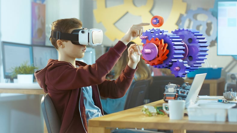 Image shows a child with a virtual reality headset on