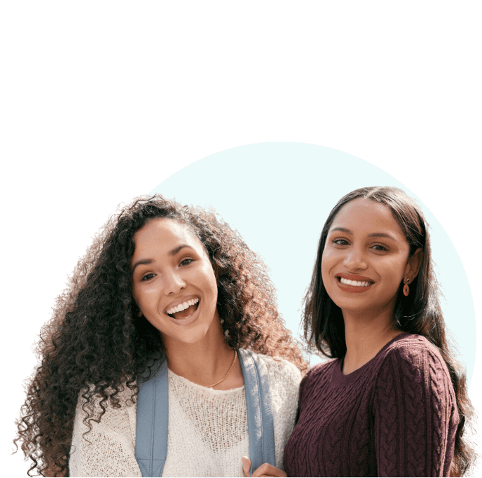 two_female_students_smiling