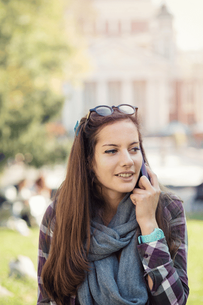 female student speaking on the phone