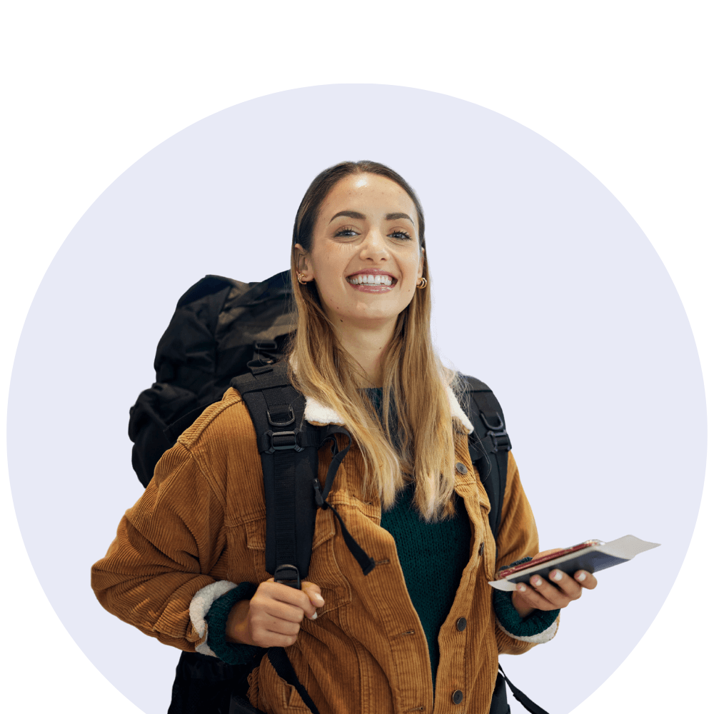 female student with backpack and passport in hand